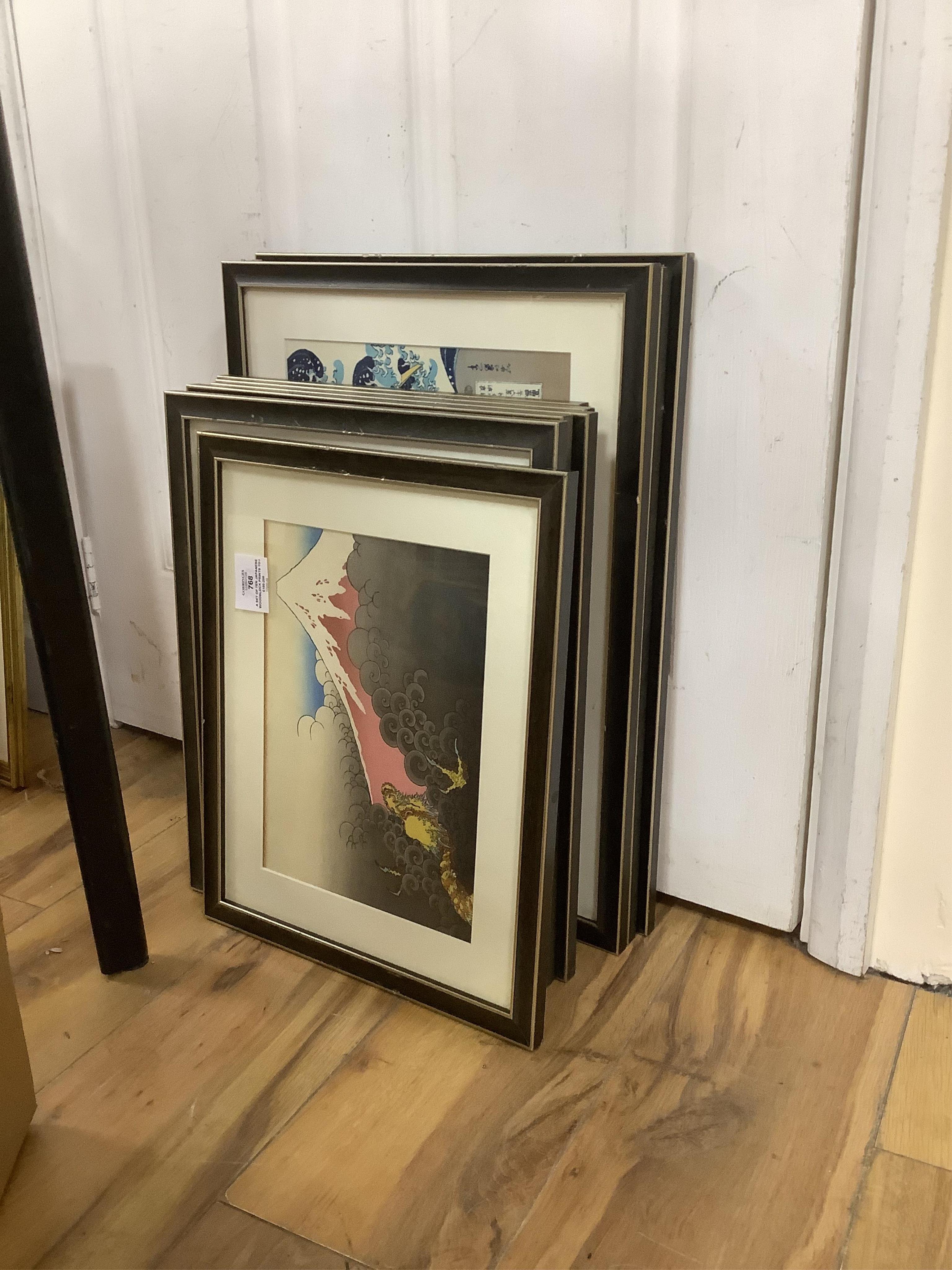 A set of ten Japanese woodblock prints to include ‘Great wave off the coast of Kanagawa’, ‘Fishermen at Kajikazawa’ and ‘Evening shower’, largest 25 x 36cm. Condition - fair